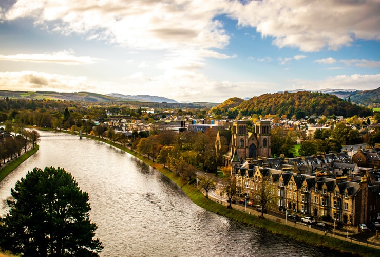 Aerial view of buildings along the River Ness in Inverness, Scotland