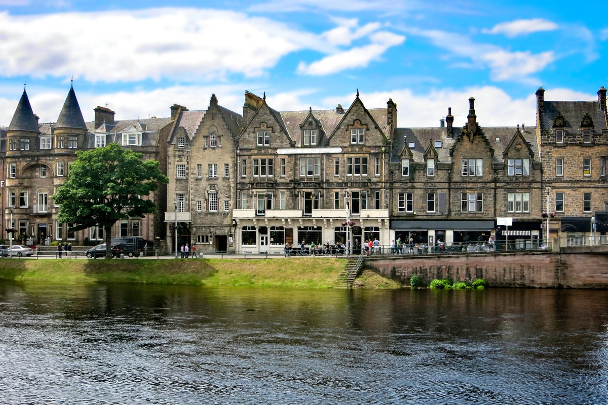 Victorian houses and shop fronts along the banks of the River Ness in Inverness