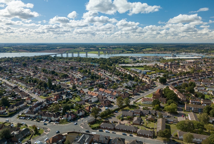 Aerial view of Ipswich residential streets with the Orwell estuary and bridge beyond