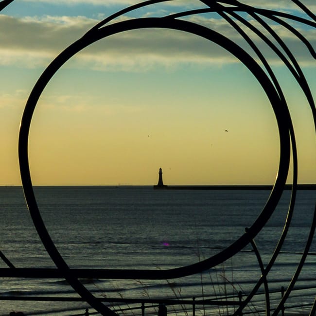 Sunrise behind Roker Lighthouse in Sunderland