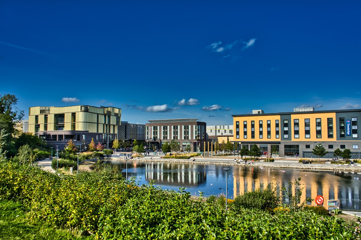 Commercial buildings around a small lake in Telford town centre