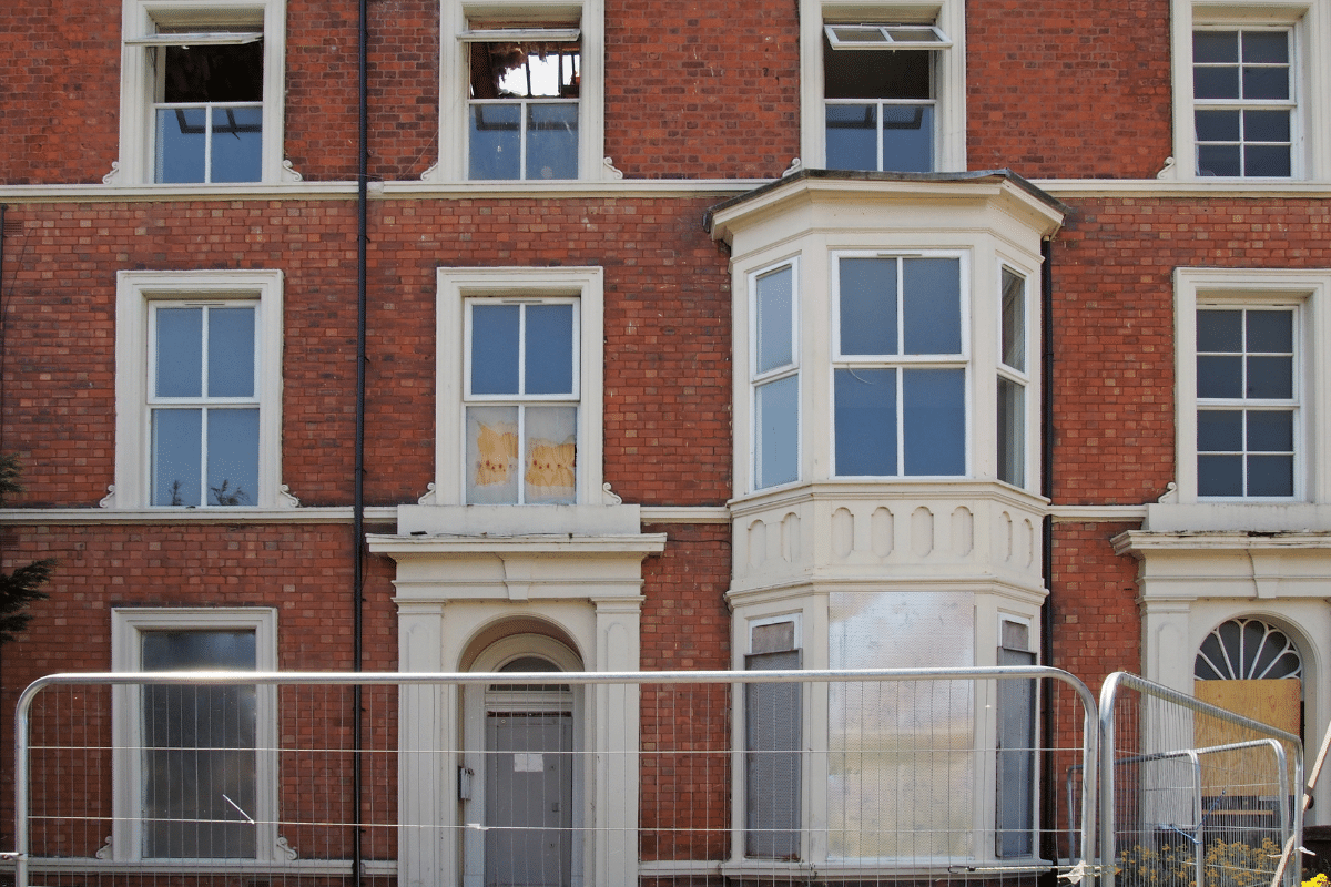 Boarded up terrace house